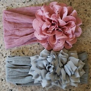 Two Baby Bling Bow Headbands with flowers on top